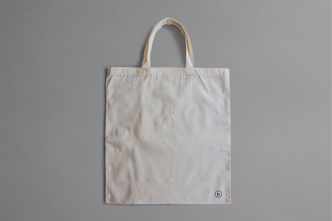 white reusable bag on gray surface